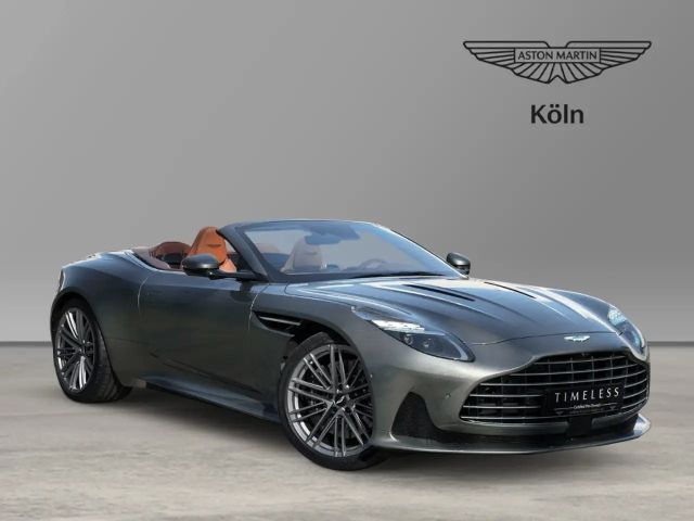 Aston Martin DB12 Volante Titanium Grey / Q- Centenary Saddle Tan 2025 Benzine
