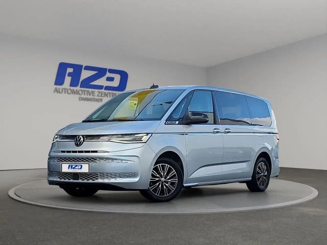 Volkswagen T7 Multivan eHybrid LANG AHK 7SITZ T-LEDER MATRIX ACC 2024 Hybride / Benzine
