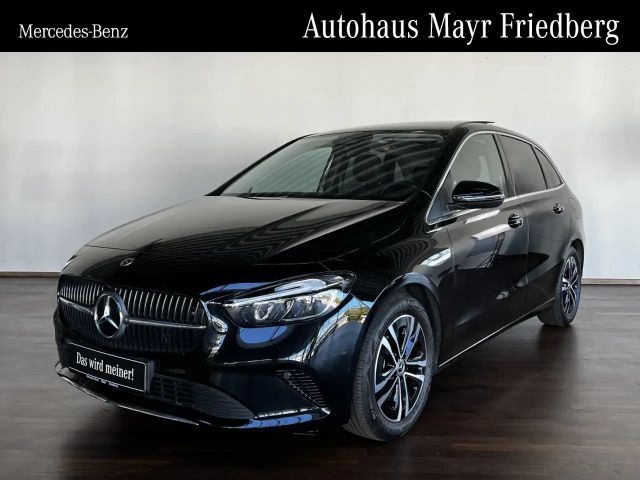 Mercedes-Benz B 200 PROGRESSIVE PANO+AHK+KAMERA+EASYPACK+17" Navi/Pano.-Dach/Autom./Klima/LED/Park-Assist./Sitzhzg./MF-Lenkrad/Komfortsitze 2025 Benzine